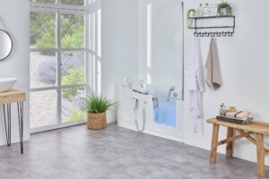 Easyriser bath with shower screen in a bathroom