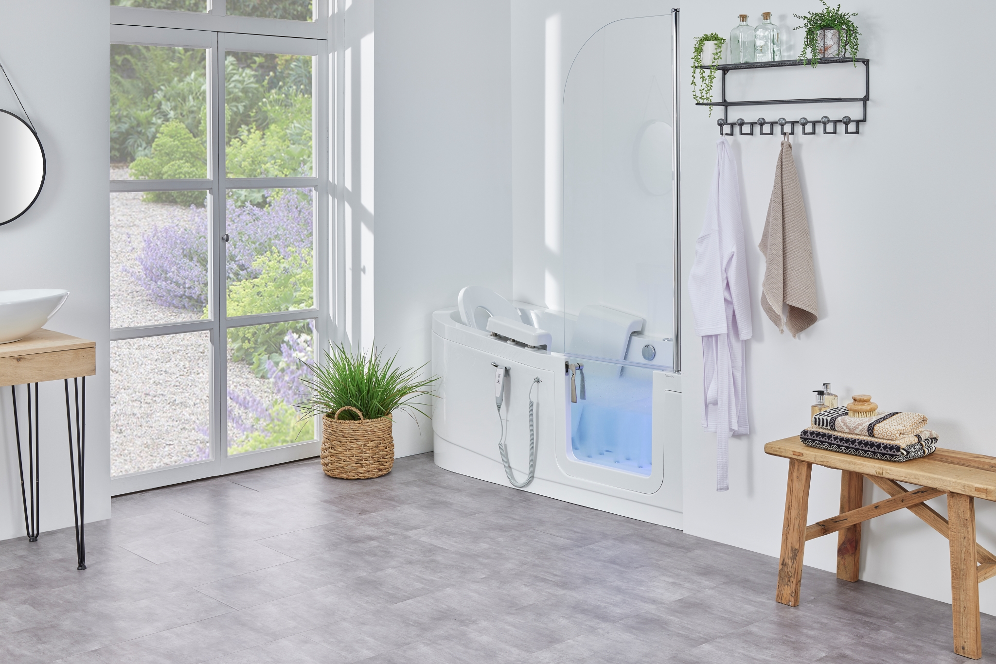 Easyriser bath with shower screen in a bathroom