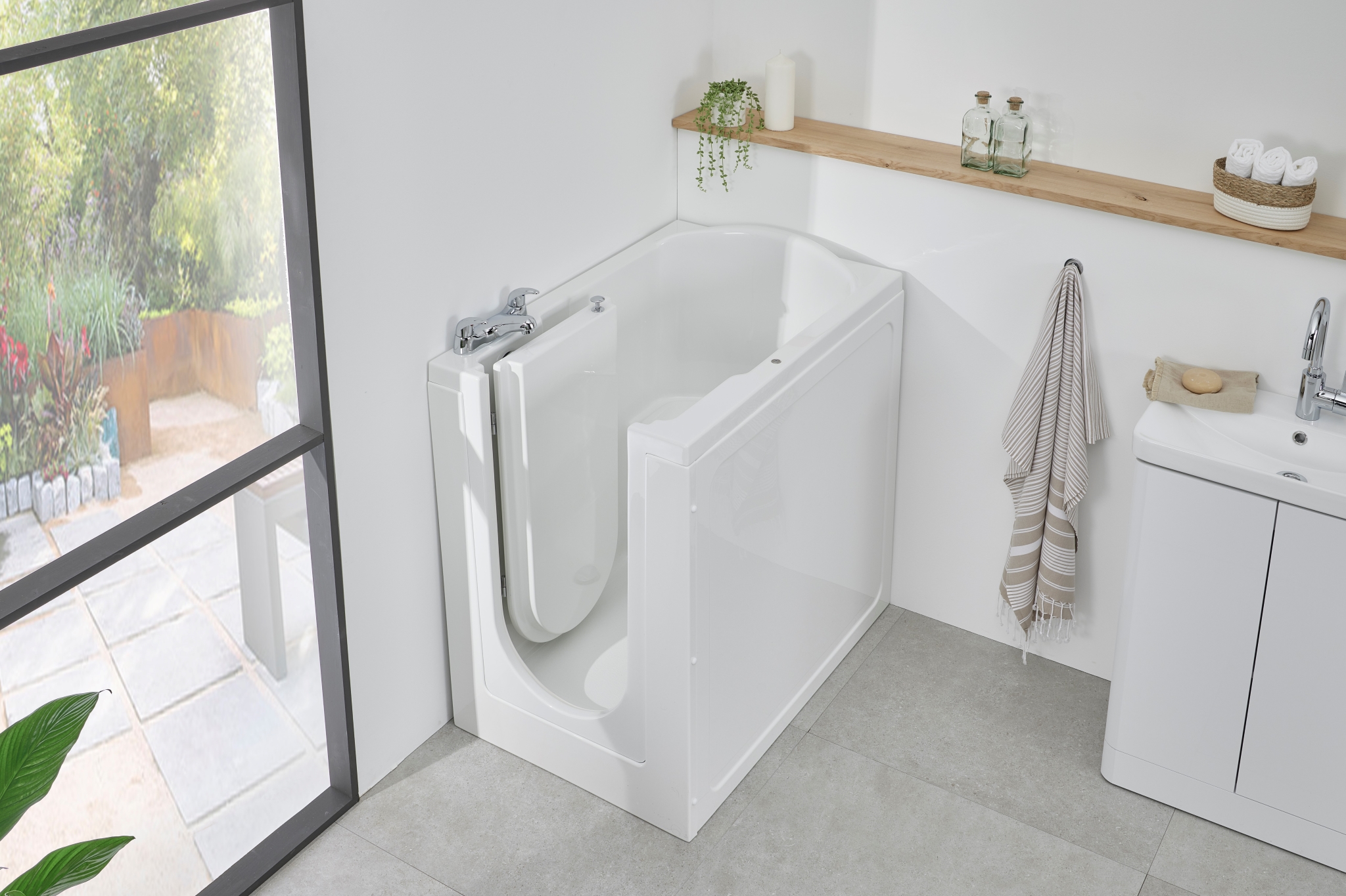 Florida walk in compact bath with door open