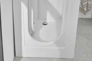 Florida walk in compact bath with door open detail