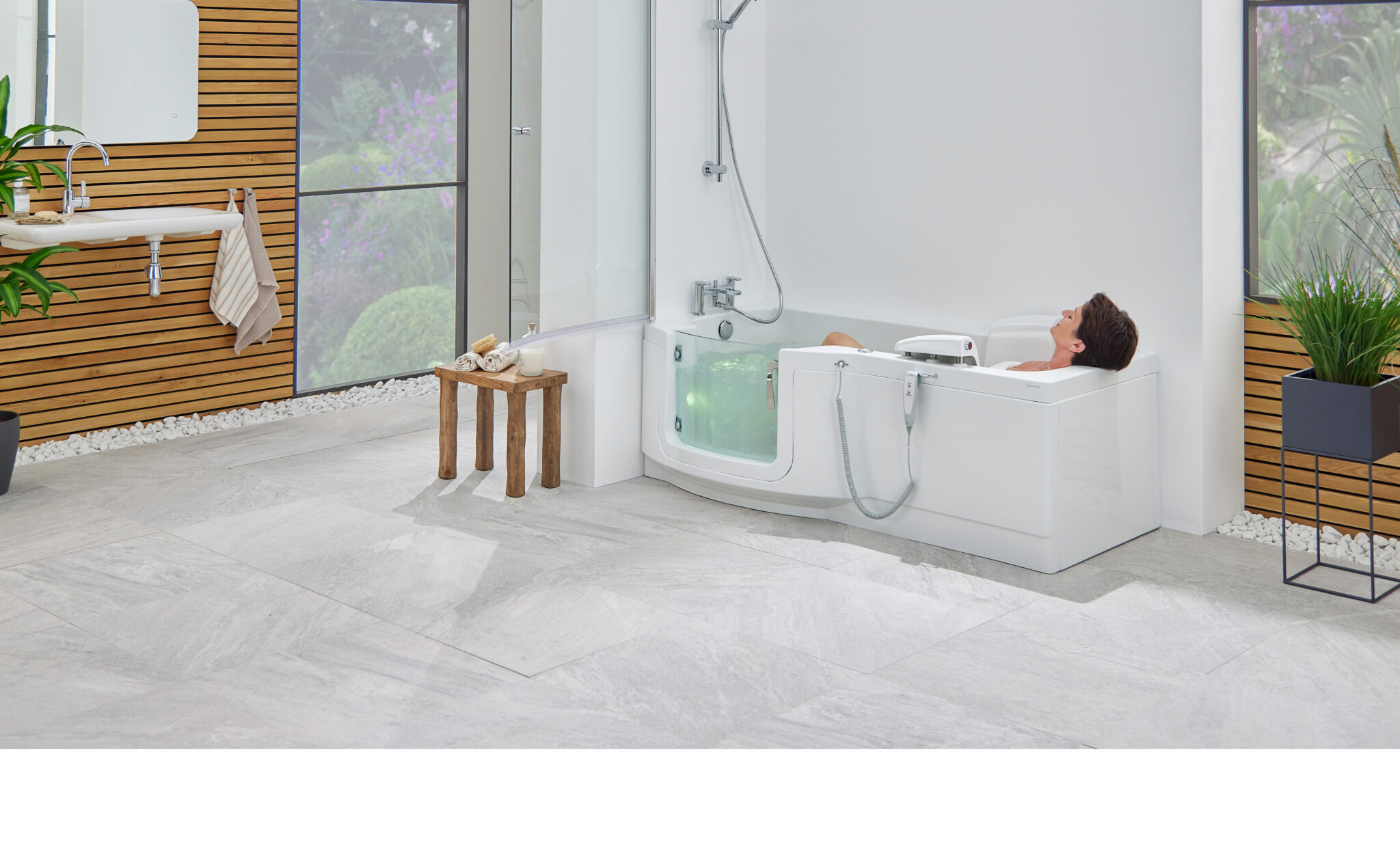 Modern Bathroom with White Bathtub, Wood Accents & Natural Light