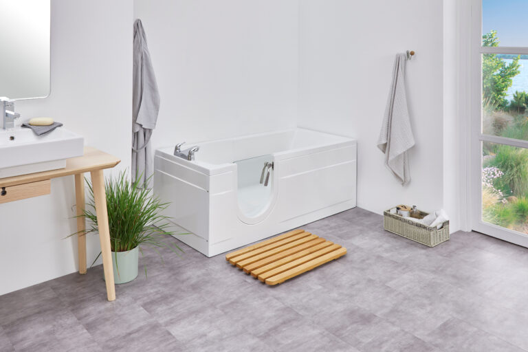 Arizona Bathroom with White Bathtub, Wooden Vanity & Natural Light